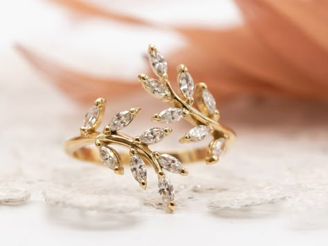 Discover our Nature-Inspired Diamond Leaf Gold Ring - a stunning blend of elegance and nature's beauty, featuring exquisite leaf-shaped diamonds in an open design, perfect for an unforgettable engagement or special occasion. 🌿 Nature-Inspired Diamond Leaf Ring 🌿 Crafted with meticulous attention to detail, this exquisite diamond leaf ring embodies the profound beauty of nature.  Delicate and graceful, it features a precious vine leaf motif that elegantly adorns the finger, carrying profound sy Leaf Design Ring, Leaf Promise Ring, Leaf Diamond Ring, Leaf Ring Design, Diamond Leaf Ring, Leaf Rings, Leaves Ring, Vine Ring, Leaf Engagement Ring