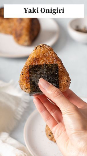 1.1M views · 3.6K reactions | Have you tried Yaki Onigiri? 🤤

I love a classic Japanese onigiri, but the extra crunch in this Yaki Onigiri is next level! These are super EASY to make and customize. I made a classic yaki onigiri without any filling, but these are great with spicy tuna, salmon, and other fillings too 😋

📝 Ingredients — makes 6 Yaki Onigiri

Sushi Rice
▢ 1 ½ cup uncooked sushi rice
▢ 2 cups water
▢ 2 teaspoon toasted black sesame seeds
▢ 2 teaspoon sesame oil

Soy Glaze
▢ ¼ cup soy sauce
▢ 2 tablespoon mirin
▢ 1 teaspoon sugar

👩🏻‍🍳 Instructions

1. Cook the sushi rice in a rice cooker. Then while warm, season with seasoning ingredients above.

2. Make the onigiri triangle shapes with a mold. 

2.5 (Optional) Add your favorite filling into the center at this step.***

3 Rice In A Rice Cooker, Yaki Onigiri, Soy Glaze, Pasta Bread, Sandwich Lunch, Tuna Mayo, Bread Sandwich, Tasty Recipes Videos, Black Sesame Seeds