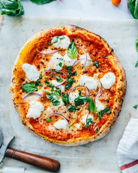 This Ooni pizza dough recipe has the best chewy texture and flavor! Use it when cooking with any outdoor pizza oven. #ooni #oonipizzadough #oonipizzaoven #pizzadoughrecipe #oonipizzadoughrecipe #pizzaovenrecipe #woodfiredpizza Ooni Pizza Dough, Goat Cheese Pizza Recipes, Avocado Pizza, Ooni Pizza, Cheese Pizza Recipe, Pizza Oven Recipes, Goat Cheese Pizza, A Couple Cooks, Baked Goat Cheese