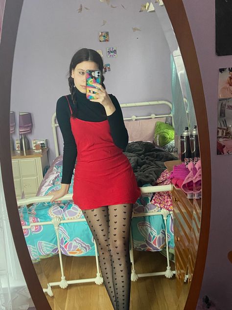 Edgy Red Dress Outfit, Valentine’s Day Dress Aesthetic, Red Concert Dress, Red Dress Layered Outfit, White Heart Tights Outfit, Pink Dress With Black Tights, Red Slip Dress Outfits Winter, Heart Stockings Outfit, Mother Mother Concert Outfit