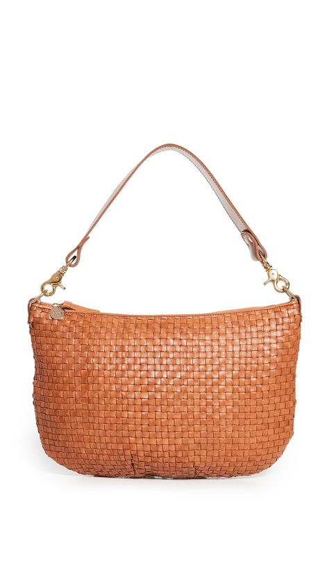 PRICES MAY VARY. Gold-tone hardware, Slouchy silhouette Length: 15in / 38cm, Height: 10.75in / 27cm, Handle drop: 6.75in / 17cm, Strap drop: 15.75in / 40cm, Depth: 0.75in / 2cm Optional strap and handle Twill lining Weight: 18oz / 0.51kg A woven leather version of Clare V.'s Moyen messenger bag, this essential handbag has everyday potential with a roomy, slouchy silhouette and multiple straps that give you the option of carrying it as a crossbody or shoulder bag. Clare Vivier, Clare V, Clare V., Cowhide Leather, Straw Bag, Messenger Bag, Fashion Bags, Bag Lady, Shoulder Bag