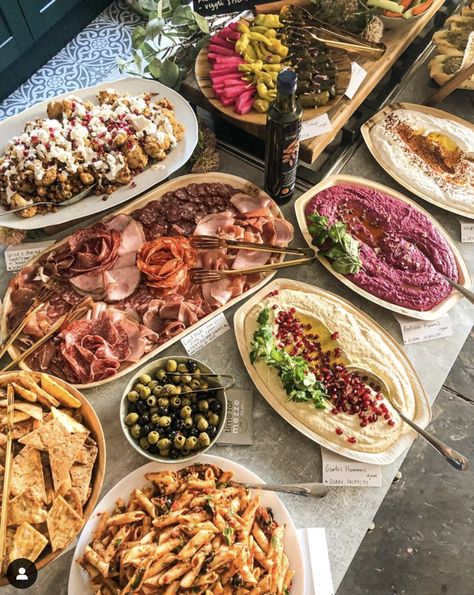 A beautiful mezze spread consisting of a variety of vegan and vegetarian dips, cured meats, roasted cauliflower, olives, pickles, salads and breads. Available to book throughout Lancashire and beyond! www.timeformezze.co.uk Christmas Buffet Vegetarian, Italian Mezze Platter, Mezze Buffet, Mezze Table, Lebanese Catering, Lebanese Mezze, Mediterranean Buffet Ideas, Snack Table Ideas, Mediterranean Buffet