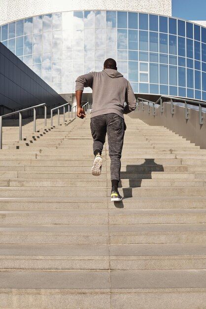 Photo man running outdoors up stairs | Premium Photo #Freepik #photo #man-exercise #man-jogging #active-lifestyle #running-sport Running Up Stairs, Man Exercise, Up Stairs, Person Running, Model Shoot, Beautiful Red Roses, Man Go, Running Man, Man Running