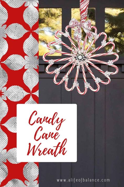 My take on a candy cane wreath is a little different than those I keep seeing on Pinterest. My wreath uses giant candy canes and all candy canes face the same direction.Get all the details on the blog here: https://alifeofbalance.com/candy-cane-wreath/ I Christmas Balls Wreath Diy, Candy Themed Christmas, Candy Cane Christmas Decorations, Giant Candy Cane, Glitter Snowflakes, Ball Wreath, Giant Candy, All Candy, Candy Cane Wreath