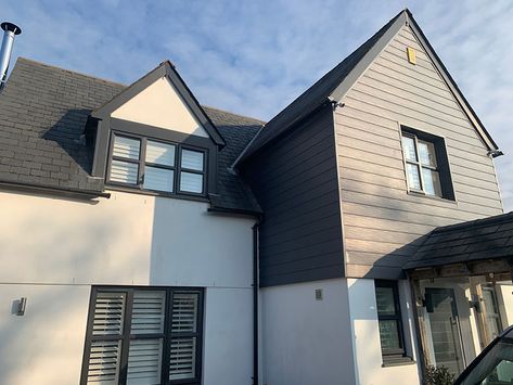 White Cladding House Exterior, Render And Cladding, Cream Render Black Windows, Black Cladding Exterior, Agate Grey Windows With Render, Monument Cladding With Black Windows, Dark Grey Cladding Exterior, Cladding House Exterior Uk, House Exterior Uk