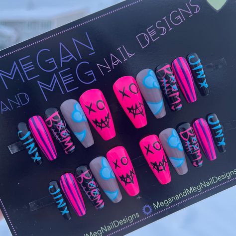 Absolutely obsessed with these Jinx-inspired nails! 🎀💥 The bold colors, edgy details, and those adorable cloud tattoos—everything screams chaos and charm! 💙💖 What’s your favorite detail? #JinxNails #arcanenails #CustomNailArt #arcanejinx Chaotic Nail Designs, Jinx Inspired Nails Arcane, Arcane Nails Hextech, Jinx Themed Nails, Jinx Arcane Nails Design, Jinx Arcane Acrylic Nails, Arcane Jinx Inspired Nails, Jinx Nails Design, Jinx Hair Color