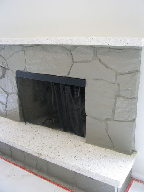 34 Beautiful Stone Fireplaces That Rock Painting A Rock Fireplace, Painting Stone Fireplace, Painting A Rock, Painted Rock Fireplaces, Painted Stone Fireplace, Stone Fireplace Makeover, Stucco Fireplace, Rock Fireplace, Tall Fireplace