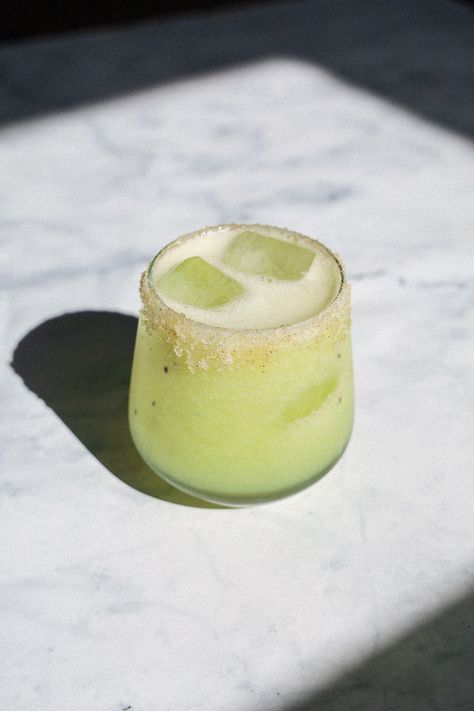 A recipe for a beautiful green cucumber and kiwi margarita, sweetened with agave and balanced with lime. Kiwi Margarita, Kiwi Cocktail, Cucumber Margarita, Flakey Salt, Small Cucumber, Lime Salt, Cucumber Juice, Box Grater, Fine Mesh Strainer