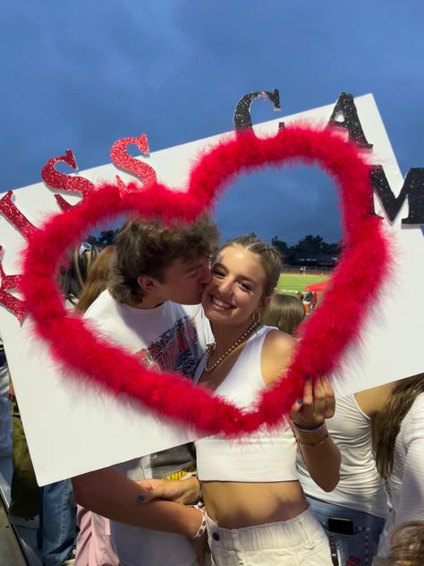 Kiss cam, football game poster, highschool inspo, relstionship goals, couple goals, hoco inspo Kiss Cam Football Game Poster, Valentine’s Day Activities High School, Hoco Game Posters, Valentines Day High School, Kiss Cam Halloween, Kiss Cam Poster Board, Kiss Cam, School Spirit Posters, 2000s Party