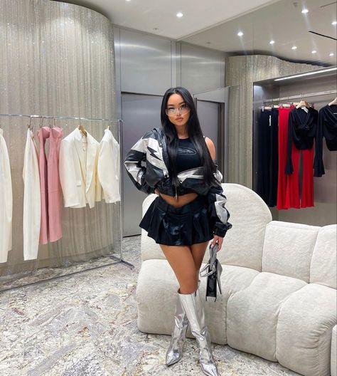 Sliver Boots Outfits Black Women, Mini Skirt Outfit Black Women Winter, Mini Skirt Outfit Black Women Birthday, Sliver Skirts Outfit, Black Cargo Mini Skirt Outfit, Skirt And Boots Outfit Black Women, Silver Skirt Outfit Black Women, Silver Boots Outfit Black Women, Mini Skirt Concert Outfit