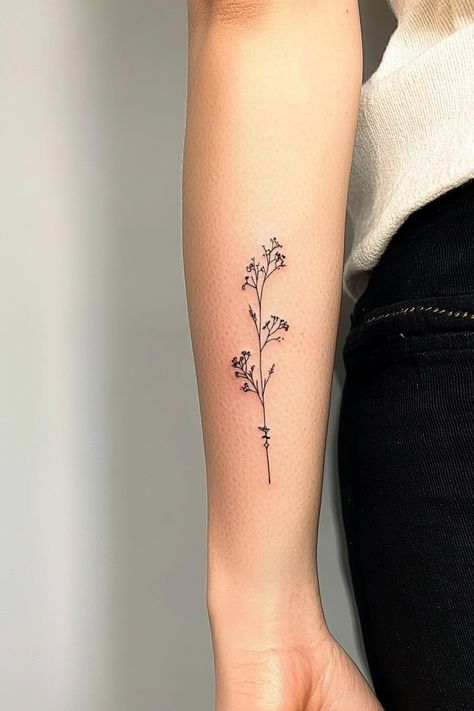 A delicate floral tattoo on a person's forearm. Big Tattoo Ideas Female Meaningful, Cute Small Tattoos Unique, Meaning Tattoos For Women, Small Female Tattoos, Small Tattoo Designs For Women, Tiny Symbols, Small Anchor Tattoos, Female Tattoo Ideas, Small Bee Tattoo