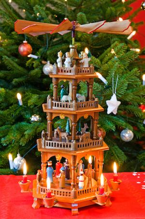 German christmas pyramid - image shutter stock German Christmas Traditions, Christmas Pyramid, German Christmas Pyramid, Christmas In Germany, Bow Garland, German Christmas Markets, Candle Topper, Christmas Traditions Family, German Christmas