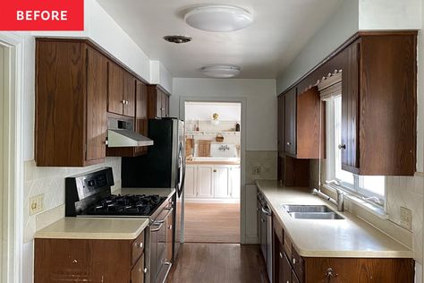 This small galley kitchen — updated once in the ‘50s and again in the ‘80s — was (literally) not a great fit for this family of seven. Credit: <a href="https://www.instagram.com/lindseybadenhop/">Lindsey Badenhop</a> Galley Kitchen With Pass Through Window, Open Up Galley Kitchen Before And After, Opening Up Galley Kitchen, Low Light Kitchen, Kitchen Renovation Before And After, Tiny Galley Kitchen Ideas, Opening Up A Galley Kitchen, Walk Through Kitchen, Narrow Kitchen Ideas