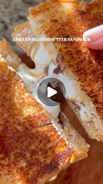 Jenn Ubbens on Instagram: "•Grilled FlufferNutter Sandwich•
Marshmallow, creamy peanut butter, and chocolate are grilled to perfection.  Creating a warm, gooey, crunchy, and sweet nostalgic sandwich. 

Follow @thehomechefmomma for more everyday recipes.

#recipe 
Grilled Flutternutter Sandwich 
2 slices of bread
Creamy peanut butter
Marshmallow creme (fluff)
A handful of chocolate chips
1-2 tbsp Unsalted butter

1.  Heat a medium skillet over low-medium heat.
2. Spread peanut butter on one side of bread and then marshmallow onto the other side of the bread.  Sprinkle with a few chocolate chips and then close the sandwich.
3. Place 1 tbsp of butter into the skillet and once it melts add the sandwich. 
4. Cook for about 2 minutes, or until browned and then flip (add another tbsp of butter to Flutternutter Sandwich, Toasted Peanut Butter Sandwich, Peanut Butter Honey Sandwich, Peanut Butter Grilled Sandwich, Grilled Peanut Butter And Fluff Sandwich, Grilled Peanut Butter And Jelly Sandwich, Fluffernutter Sandwich, Peanut Butter Marshmallow, Peanut Butter And Chocolate