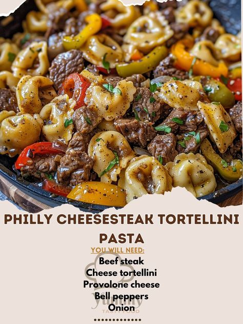 🥩🧀 Twist your taste buds with Philly Cheesesteak Tortellini Pasta! Cheesy, meaty, absolutely delicious! #PastaPerfection Philly Cheesesteak Tortellini Pasta Ingredients: Beef steak, thinly sliced (1 lb (450 g)) Cheese tortellini (1 lb (450 g), cooked) Provolone cheese, shredded (1 cup (100 g)) Bell peppers, sliced (1 cup (150 g)) Onion, sliced (1 cup (150 g)) Olive oil (2 tbsp (30 ml)) Salt and pepper to taste Instructions: Sauté onions and peppers in olive oil until soft. Add beef and co... Cheesesteak Tortellini, Pasta Orzo, Unique Pasta Dishes, Orzo Risotto, Sauté Onions, Unique Pasta, Fall Dinners, Recipe Pasta, Tortellini Pasta