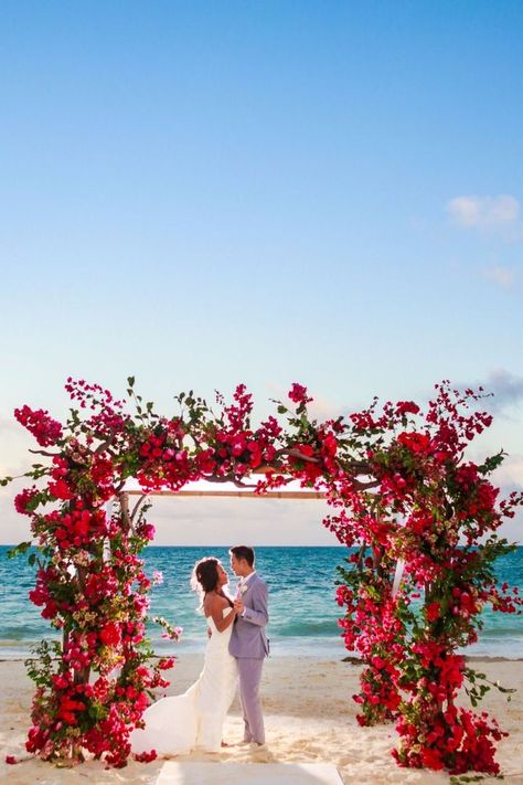 Over grown flower arch on the beach Wedding Backdrop Beach, Floral Beach Wedding, Beach Wedding Decorations Reception, Rustic Wedding Decorations, Jamaica Wedding, Wedding Ceremony Ideas, Colorful Wedding Flowers, Wedding Presents, Wedding Arches