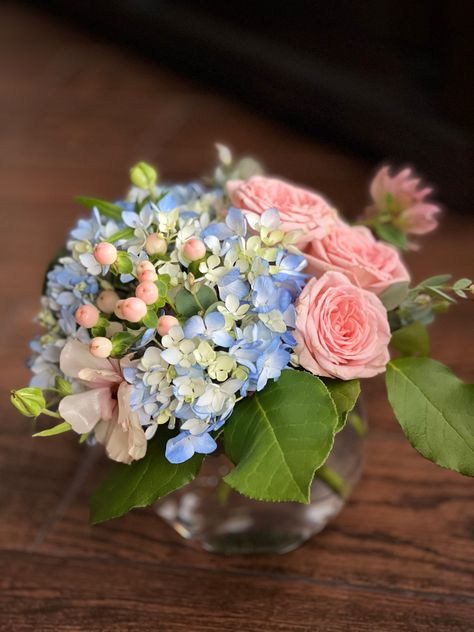 White Hydrangea With Pink Roses Centerpiece, Peonies And Hydrangeas Centerpieces, Blue Hydrangea Pink Roses, Peony And Hydrangea Arrangement, Blue Hydrangea And Pink Rose Bouquet, Pink Blue And White Flower Arrangements, Blue And Pink Flower Arrangements, Pink And Blue Centerpieces, Hydrangea Baby Shower Ideas