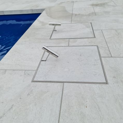 Check out how a first-class pool is finished off with two HIDE Skimmer Lids. Tiling by: StarTiling services Pty ltd Construction company Star Tiling Services 0415 209 004 www.startilingservicesptyltd.com.au @hideskimmerlids How good do these Skimmer box lids look 👌📥 ( #📷 @startilingservicesptyltd.com.au ) #tiling #pooltile #poolside #skimmerbox #hide #customlid #hardscape #tiler #stoneinlay #poolcover #luxurypool Pool Detail, Pool Landscapes, Skimmer Pool, Pool Surrounds, Hidden Pool, Star Tile, St Elizabeth, Iron Stair Railing, Swimming Pool Landscaping