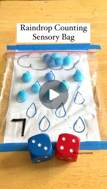 Fynn Sor | Happy Tot Shelf on Instagram: "Turn counting into a joyful adventure with the Pompom Raindrop Sensory Bag! 🌧️ Guess what? The liquid in the bag is just water! Tip: Squeeze out as much air as possible from the bag and secure the zipper bag to the table. 👉🏻 Ideal for 3 to 6-year-olds. For 3 to 4-year-olds, write numbers from 1 to 12 and have your child move the matching number of pompoms to the raindrops. For 5 to 6-year-olds, roll 2 dice, Push the matching number of pompoms to the raindrops. Count the total number of pompoms and write the sum on the zipper bag with whiteboard marker. ❤️ Love this activity? Please share this video with all your friends! If you are new here, follow us @happytotshelf for more easy and fun learning activities for kids! . #learningisfun #handsonle Fun Learning Activities For Kids, Fun Learning Activities, Learning Activities For Kids, Sensory Bag, Weather Theme, Sensory Activity, Sensory Table, Whiteboard Marker, Kids Sensory