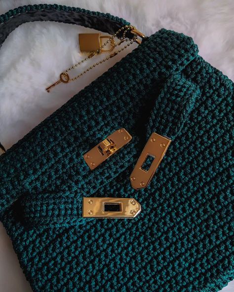 Introducing our stunning handcrafted crochet bag in vibrant emerald green! 👜 Featuring a popular bag opening mechanism, this design combines elegance and functionality, ensuring easy access while keeping your belongings secure. 🔐 With internal reinforcement for a structured shape and a luxurious satin lining, this trapezoid bag is perfect for both special occasions and everyday outings. The golden hardware adds a touch of sophistication to the overall design.🦪♥️ Available in various colors ... Shop Bag, Popular Bags, Overall Design, Crochet Bags, Crochet Bag, Emerald Green, Easy Access, Emerald, Amigurumi