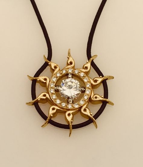 18k yellow gold sun pendant framing a 1.54ct round diamond with pave diamonds on leather.... by Mark Loren Sun Pendant Gold, Sun Accessories, Sun Jewelry, Sun Pendant, Gold Sun, Fantasy Jewelry, Jewelry Inspo, Dream Jewelry, Pretty Jewellery