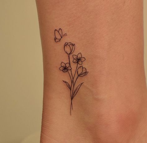 Tattoo Ideas March Flower, Cute Pretty Tattoos, Tattoo Ideas Simple Flower, Simple Cute Flower Tattoos, Flower And Butterfly Tattoos For Women, Dainty Line Tattoos For Women, Tiny First Tattoos, March Tattoo Flower, Tulip And Daisy Bouquet Tattoo