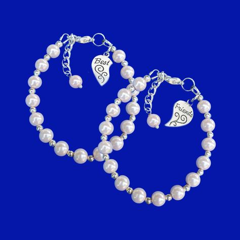 A set of 2 silver accented pearl charm bracelets for Best  Friends. Keep one for yourself and give the other to your friend. Matching Best Friend Bracelets, Best Friend Bracelets For 2, Sister Bracelets, Sisters Bracelet, Big Sister Bracelet, Charmed Sisters, Little Sister Gifts, Big Sisters, Pearl Charm Bracelet