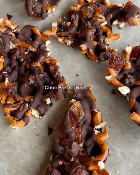 Rae Leach, MS, RD on Instagram: "Chocolate Pretzel Date Bark for the sweet & salty lovers 🥨🤎  The dates add the perfect caramel-y flavor and chewiness to this easy freezer bark! If you like chocolate covered pretzels, you’ll love this one. It’s also dairy free and lower in sugar for those of you who need, and made with just 4 ingredients.  - 1/4 cup Hu Kitchen no sugar added dark choc chips - 1/3 cup pretzel mini twists - 3 large medjool dates, pitted - 1 tsp coconut oil  1. Chop up pretzels and dates into small pieces, then spread out on wax or parchment paper-lined baking sheet.  2. Melt chocolate chips with coconut oil for 20 sec at a time in microwave, stirring between each interval.  3. Pour chocolate over bark, then freeze for 30 min to 1 hr or until firm and eat immediately. Store Chocolate Dipped Dates, Date Chocolate Pretzel, Dates Dipped In Chocolate, Chocolate Date Bark, Peanut Butter Stuffed Dates Chocolate Covered, Pretzel Chips, Vegan Nice Cream, Gluten Free Dairy Free Dessert, Covered Pretzels