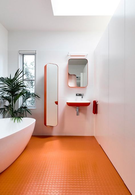 Designboom | orange coin flooring bathroom Secret Cellar, Orange Bathrooms Designs, Bathroom Renovation Diy, Orange Floor, Diy Bathroom Makeover, Orange Bathrooms, Hidden Garden, Diy Bathroom Remodel, Bad Design