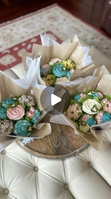 Connie Pacifico | Floral Cupcake Artist 🇨🇦 on Instagram: "When you order a 7-cupcake bouquet, you'll delight in the beauty of floral buttercream cupcakes, which are nestled in a reusable galvanized basket designed to enhance presentation and ease handling. Bon appétit! . . . . . . #cupcakes #cakes4cakelovers #flowersofinstagram#buttercreamflowers #reelsinstagram #cupcakebouquet #bakingtips #bouquetwrapping #floralcupcakes #edibleart #cupcakeart #cakedecorating #flowercupcakes #cakeart #reels #trending #likes4likes #trendingreels #customcupcakes #edibleflowers #cupcakedecorating #cupcakelove #cakeartist #bouquet#cupcakestyles #buttercreamcupcakes#candiacmaville #montrealcupcakes #montreal" Cupcake Bouquet Centerpiece, Cupcake Arrangements, Cake Basket, Buttercream Cupcakes, Floral Cupcakes, Cupcake Art, Cupcake Display, Cupcake Bouquet, Custom Cupcakes