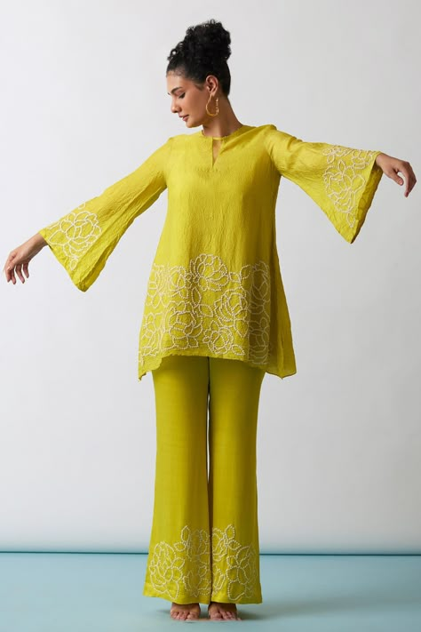 Shop for these amazing collections of Yellow Kurta Viscose Silk Hand Embroidered Floral A-line Short And Pant Set For Women by One Not Two online at Aza Fashions. Modal Satin Kurti, Short Kurti Salwar Suit, Pant And Short Kurti Designs, Kurti Pant Set Design, Bottom Designs For Suits, Short Kurti Pants Design, Short Kurta And Pants Women, Short Kurti And Pants Outfit, Tunic For Women