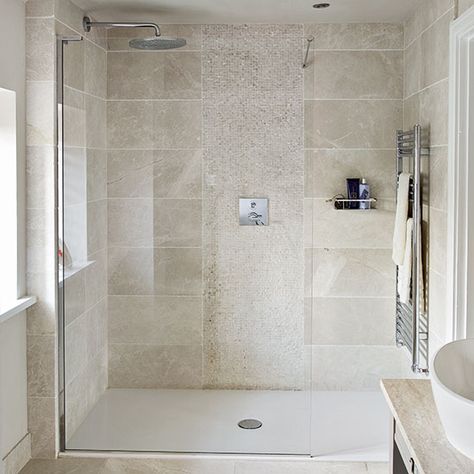 After traditional bathroom decorating ideas? Take a look at this neutral bathroom with beautiful tiles from Ideal Home for inspiration. Find more bathroom decorating and shopping ideas at housetohome.co.uk Natural Stone Tile Bathroom, Stone Tile Bathroom, Traditional Bathroom Decor, Makeover Kamar Mandi, Beige Bathroom Ideas, Neutral Stone, Neutral Shower, Beautiful Tiles, Neutral Bathroom