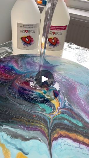 1.1K views · 274 reactions | I just couldn’t resist this audio! 🪩💃🕺

✨ It’s topcoat time! ✨ Watch this 40cm acrylic pour shine as the resin brings out every vibrant detail 🤩

Crafted with @amsterdamacrylics paints and rich pigments from @perfectpearlsandpigments & @jacquardproducts, this piece truly bursts with life. Now sealed with @art_resin for a lasting, glossy finish ✨

This beauty has found its new home with one of my valued collectors, but there are plenty more stunning pieces available! I ship worldwide 🌍 – just DM me for a direct link to my Etsy store 🔗💫

#AcrylicPour #ResinArt #EpoxyFinish #FluidArt #ArtCollectors #ShinyArt #UniqueArt #WorldwideShipping #artresin | Nichola Scaldwell Art | Cartoon Band · Funky Town Acrylic Pour Round Table Top, Trippy Pour Painting, Creative Walls, Acrylic Pouring Techniques, Art Cartoon, Art Hobbies, Fluid Acrylic Painting, Art Resin, Paint Pouring