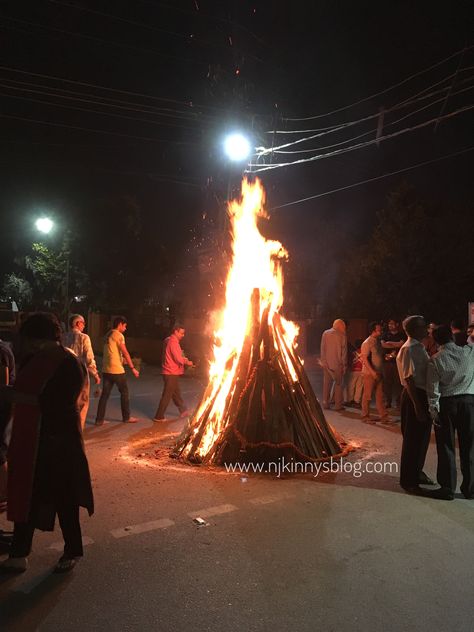 Holika Dahan where a bonfire is lit and people worship in circles by offering food, wheat and cowdung cakes to the fire. It represents the victory of faith in God and goodness over evil. 😊 Happy Holi! #NWoBSBlog #IndianFestival Holika Dahan Instagram Story, Holi Fire Festival, Holi Dahan Video, Holika Dahan Snap, Holi Story Instagram, Happy Holi Aesthetic, Holika Dahan Video, Holi Dahan, Holi Story