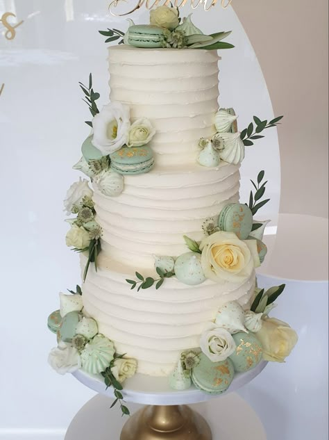 Buttercream wedding cake Sage mint green wedding cake with macarons meringue kisses and fresh flowers at Prested Hall Essex wedding venue Sage Cake Wedding, Cakes With Green Decorations, Mint Green Wedding Cake Ideas, Wedding Cake Ideas Sage Green, Wedding Cake Mint Green, Sage Quince Cake, Quincera Themes Ideas Sage Green, Blush And Green Wedding Cake, Sage Green Venue Wedding