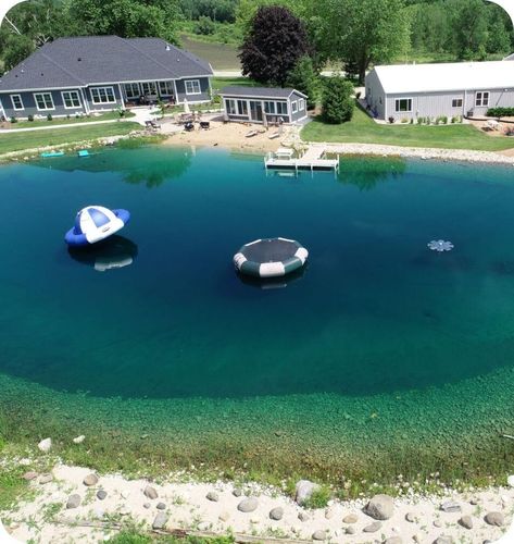 Creating the perfect family gathering place filled with giggles and cannonballs. - Wisconsin Lake & Pond Basic Backyard, Backyard Transformation, Pond Construction, Farm Pond, Ultimate Backyard, Natural Swimming Ponds, Outdoor Ponds, Diy Pond, Backyard Lawn