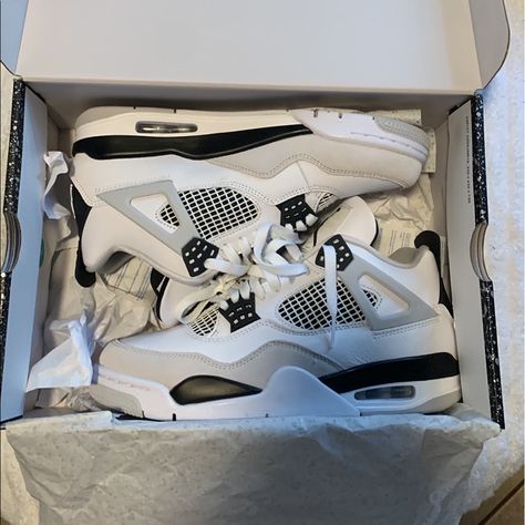 Gray and white jordans