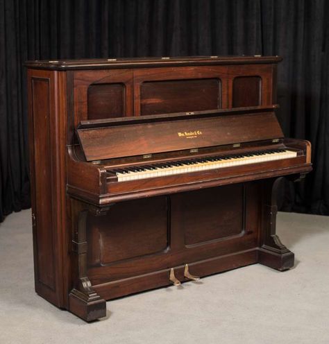 This lovely upright piano was built by Knabe in 1886. Although the piano is a Victorian era upright, the cabinet is beautifully simplistic and elegant without a lot of excessive carving and frills. The instrument is made of richly figured Brazilian Rosewood which gives the instrument an overall formal appearance. Shop now on our website! #pianoforsale #uprightpiano #victorian #victorianstyle #victoriandecor #victorianpiano #rosewood #antiques #antiquepiano #antiquefurniture #furniture #homedecor Wooden Piano Aesthetic, Old Upright Piano, Victorian Piano, Piano History, Orchestra Instruments, Red Grand Piano, Piano Restoration, Piano Shop, Old Piano