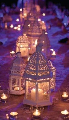 Moroccan lanterns cast a lovely glow here, this table really sparkles with all the lit votives. Love! Arabian Wedding, Arabian Nights Party, Moroccan Candles, Moroccan Wedding, Moroccan Lanterns, Bohol, Arabian Nights, Candle Lanterns, Decoration Table