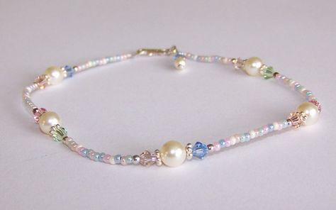 Handmade beaded anklet by Sapphire Rain Designs created with Swarovski "cream" crystal pearls, Swarovski crystals in an assortment of pastel colors, glass seed beads in a pastel mix, sterling silver Bali spacer beads, sterlling silver beads, findings and clasp.  9 1/2" in length.  Comes in gift box. Pastel Beaded Jewelry, Elegant Crystal Bracelet With Colorful Beads, Cute Pastel Beaded Jewelry, Blue Crystal Bracelet With Colorful Beads, Adjustable Pastel Beaded Jewelry, Rain Design, Pearl Anklet, Chainmaille Bracelet, Handmade Beaded Necklaces