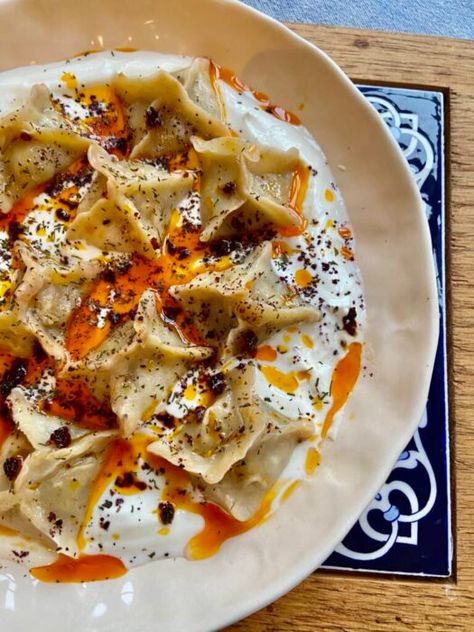 Vegetarian Manti, Turkish dumplings with sautéed onions, chickpeas and spices | Ozlem's Turkish Table Turkish Food Manti, Turkey Food Photography, Turkish Cuisine Aesthetic, Vegetarian Turkish Recipes, Turkish Food Photography, Turkish Food Aethstetic, Turkish Dinner Table, Turkish Dumplings, Manti Turkish