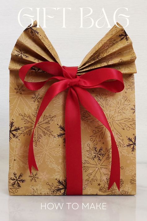 Gift wrapping bag. Paper Bag Gift Wrapping Ideas, How To Wrap A Purse As A Gift, Gift Bag Out Of Wrapping Paper, Paper Bag Design Ideas Creative, Bag With Wrapping Paper, Gift Bag From Wrapping Paper, Bag From Wrapping Paper, Paper Gift Wrapping Ideas, Bag Out Of Wrapping Paper