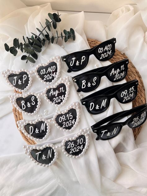 Welcome To Love Design Gift's! These special products we designed for you can be used for birthday, baptism ceremony, babyshower party, celebrations, newborn gifts, wedding gifts, engagement gifts, muslim gifts, openings etc. You can use it on all your special days. These heart shaped lightweight sunglasses are a perfect prop for your guests use in pictures taken at your wedding. As seen on TikTok, wedding sunglasses trend can be customized with your wedding date and initials of the Bride and Gr Favours For Wedding, Wedding Guest Favors Ideas Unique, Unique Wedding Gifts For Guests, Wedding Sun Glasses, Sunglasses Wedding Reception, Wedding Sunglasses Trend, Wedding Sunglasses For Guests, Wedding Extras Touches, Wedding Fun Ideas