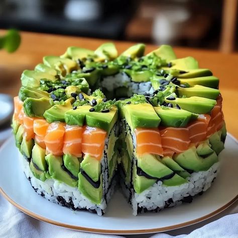 Learn how to make a stunning Avocado Sushi Cake with layers of sushi rice, creamy avocado, and fresh beef. Perfect for any occasion! Avocado Sushi Cake, Sushi Wedding, Cake With Layers, Avocado Sushi, Sweet Sushi, Sushi Cake, Rice Cake Recipes, Sushi Recipes, Sushi Rice