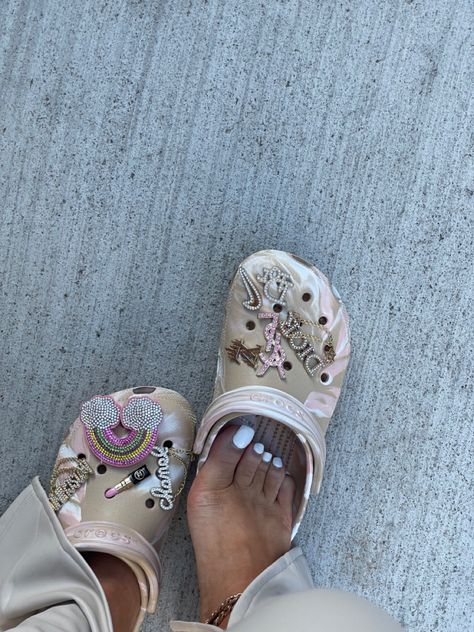 Crocs with bling jibbitz Crocs Black Women, Pink Crocs Outfit Black Women, Croc Sandals With Jibbitz, Camo Crocs With Jibbitz, Crocs Jibbitz Ideas Women, Pink Crocs With Jibbitz, White Crocs Jibbitz Ideas, Black Crocs With Jibbitz, Marble Crocs