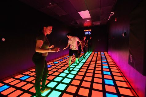 Players can test their physical and mental agility with games that combine fitness with high-tech entertainment at Activate Games. Game Place, Out With Friends, State Of The Art, Gaming Tech, Interactive Game, Game Room Design, Adventure Book, Life Challenges, Gatlinburg