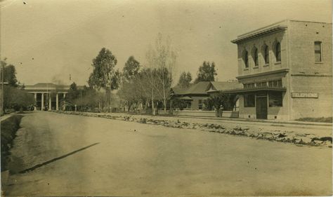 View of Main St,Porterville CA (Circa 1917).  The building with columns at the end of the street is the Morton Street School. This school was eventually torn-down to extend Main St. Porterville California, Tulare County, Small Towns Usa, Ca History, Tear Down, Local History, The Building, Small Town, Small Towns