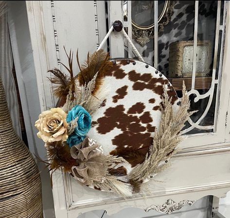 Cow Print Welcome Sign Round, Cowhide Door Hanger, Cow Hide Crafts, Western Door Hangers, Cowhide Wall Decor, Cowhide Ideas, Cowhide Crafts, Highland Cow Wreath, Western Decor Diy