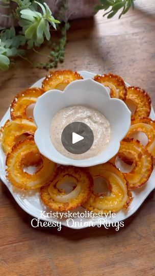 113 reactions · 25 shares | Indulge guilt-free with these Cheesy Onion Rings and Copycat Bloomin’ Onion Sauce! 🧀🌿 Perfect for keto enthusiasts craving a savory snack without the carbs. 😍🍴 Elevate your low-carb game with this delicious recipe! 💫 

❤️ like this post and 💾 save for future reference. ↗️ Share with anyone you know who loves delicious food!

RECIPE - Makes 12 onion rings
INGREDIENTS:
1 & 1/2 cups shredded Colby Jack cheese
12 onion slices
seasoned salt to taste

DIRECTIONS:
1. Preheat oven to 375 degrees Fahrenheit.
2. Place half of the shredded cheese in each ring of a donut pan.
3. Add an onion slice to each oneolifestyle
4. Top with remaining cheese and then sprinkle on some seasoned salt.
5. Bake for 20-25 minutes.
*Let cool down a bit before transferring to a paper to Cheesy Onion Rings, Bloomin Onion Sauce, Onion Slice, Baked Onion Rings, Baked Onion, Bloomin Onion, Donut Pan, Onion Sauce, Colby Jack