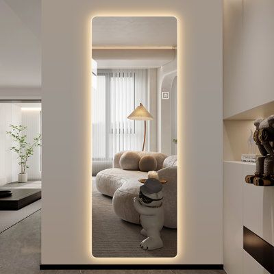 The simple and modern design allows this mirror to perfectly blend into any style of room. Full body mirrors provide a good view. | Orren Ellis Autavia Lighted Frameless Full Length Mirror | 64 H x 21 W x 3 D in | Wayfair | Home Decor Bedroom Mirror Full Length With Lights, Full Length Mirror In Closet, Floor Length Mirror With Lights, Floor To Ceiling Mirror Bedroom, Room Inspo Full Body Mirror, Led Floor Mirror, Body Mirrors For Room, Backlit Mirror Bedroom, Room Full Body Mirror